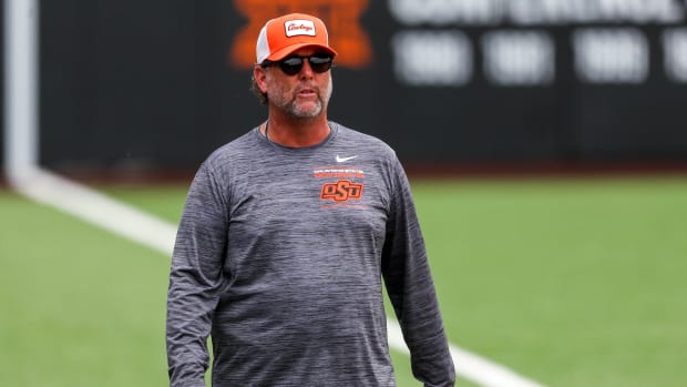 OSU head coach Kenny Gajewski walks the field during a practice at Cowgirl Stadium in Stillwater, Okla., on Wednesday, May 24, 2023.